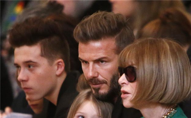 David Beckham y sus hijos, en la primera fila del desfile de Victoria