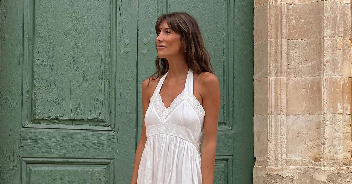 Mango Outlet rebaja el vestido blanco, midi fluido más elegante del verano: con bordado suizo por menos de 12€